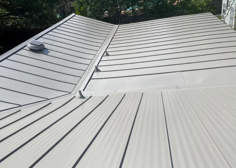 Solar attic fan installed on a metal roof for Roof Ventilation in Buena Vista
